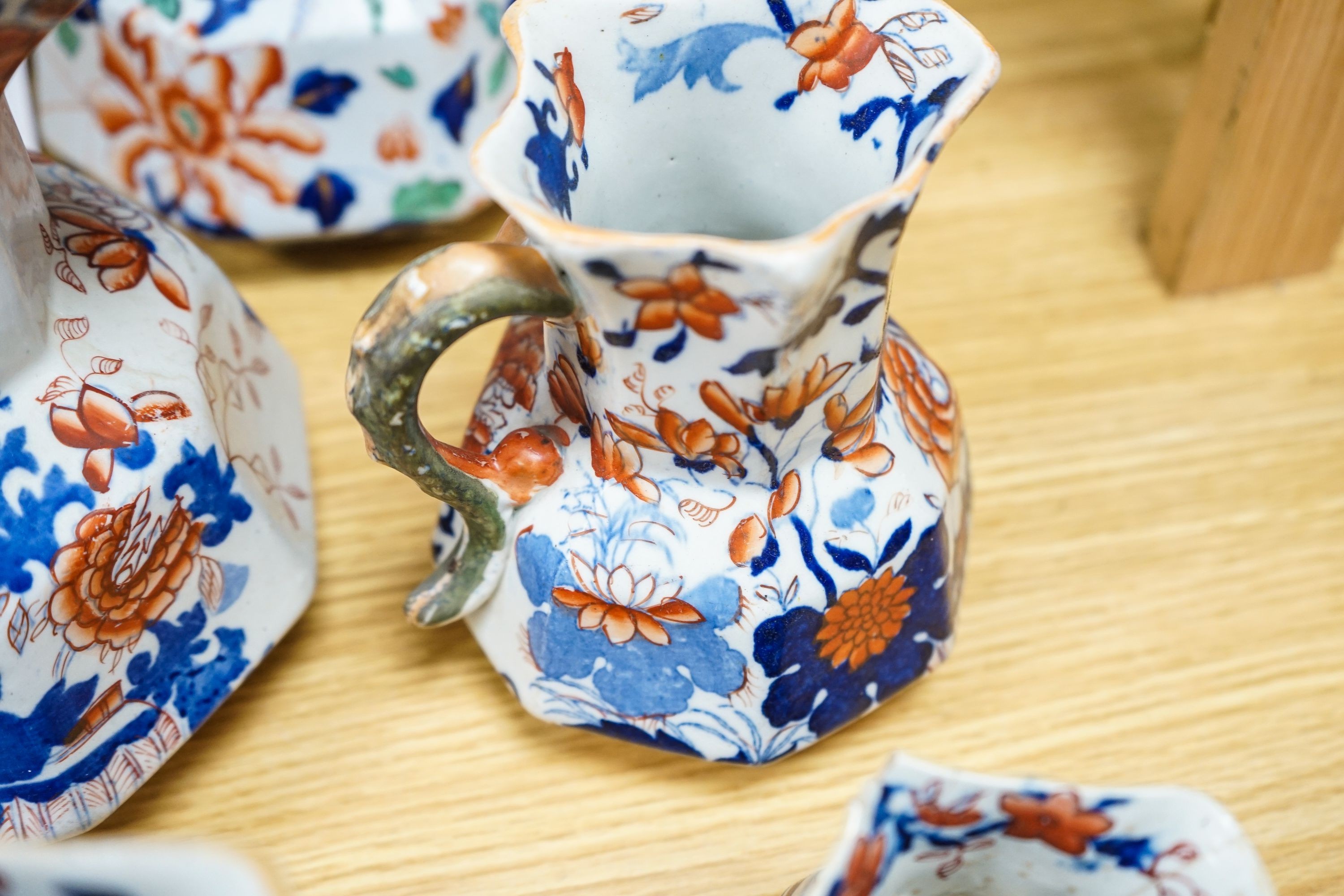 Five Masons ironstone jugs and a Masons ironstone part dinner service, to include a tureen and an oval dish